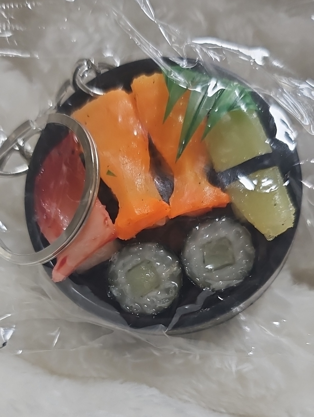 Source Unknown Black Sushi Keychain with Orange, Green and Pink Accents